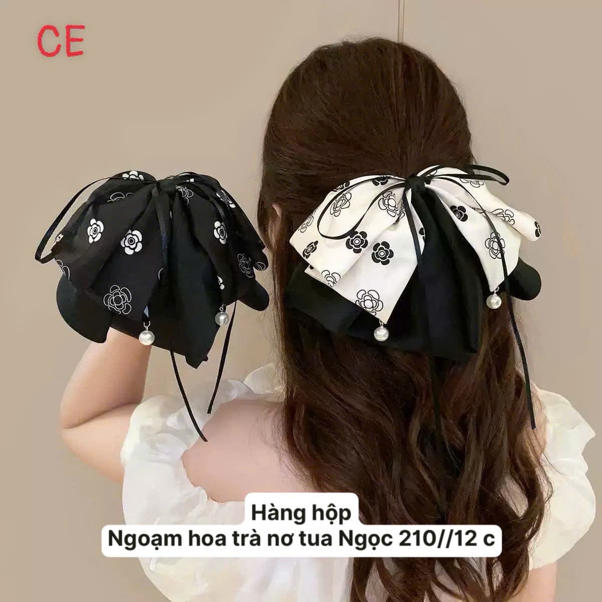 Kẹp nơ hoa trà đen trắng